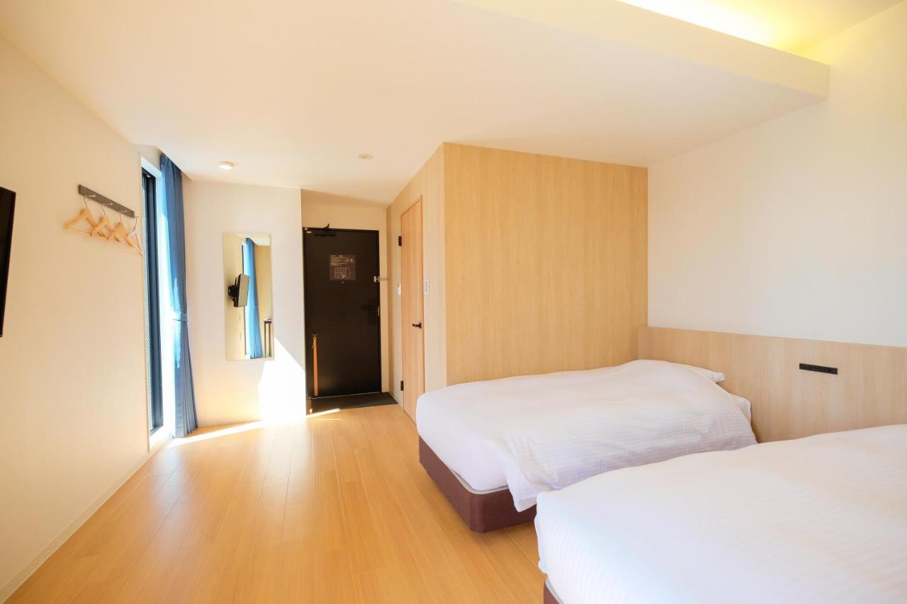 Ele Hotel Kuzuha Хираката Экстерьер фото